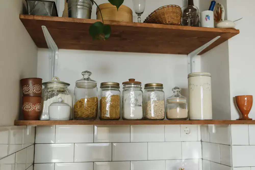 Bright shelves filled with large glass jars of wholefoods