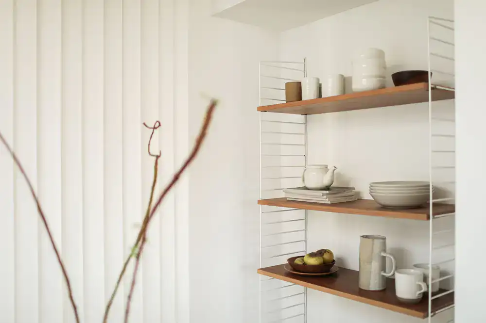 Wooden shelves stacked with natural wholefoods